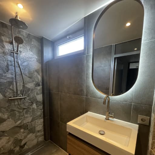 Shower and bathroom after DEYA Construction renovation in Amsterdam