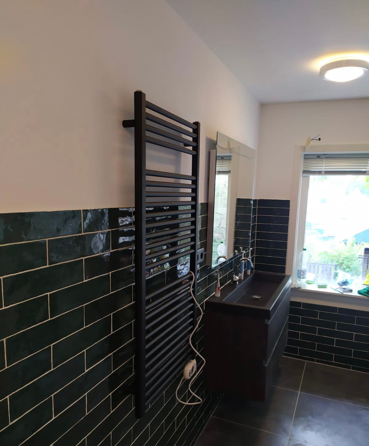 Dark and white bathroom inspiration with DEYA Construction